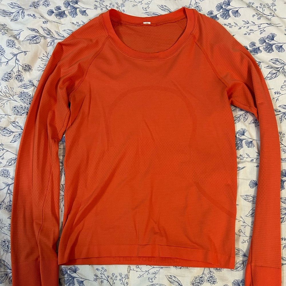 Lululemon Swiftly Tech orange size 2 long sleeve.